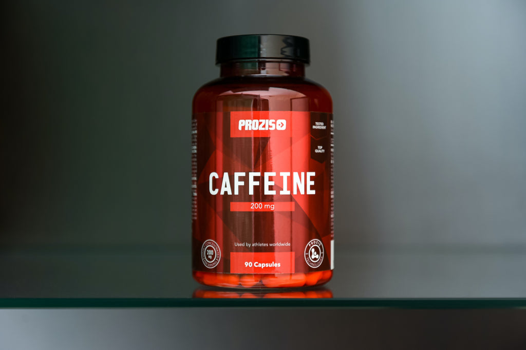 red bottle of preworkout with the word caffeine printed on it