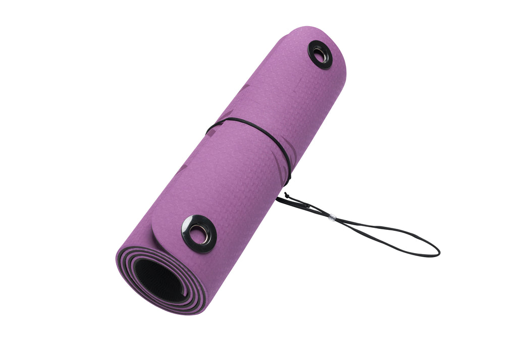 Purple yoga mat rolled up and tied with string